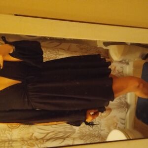 Elegant Black Dress with Long Sleeves